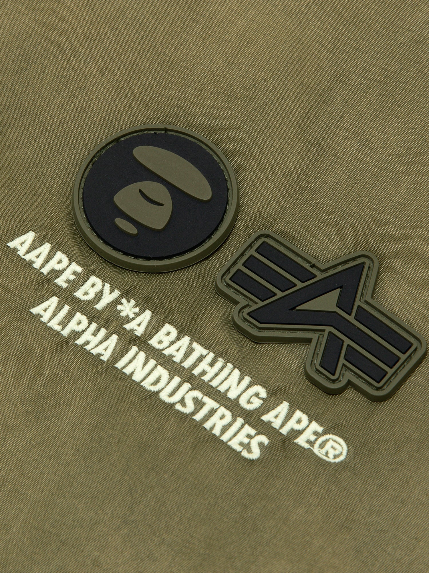 AAPE X ALPHA REVERSIBLE PADDED MA-1 QUILTED JACKET OUTERWEAR Alpha Industries / FW24-AAPE 