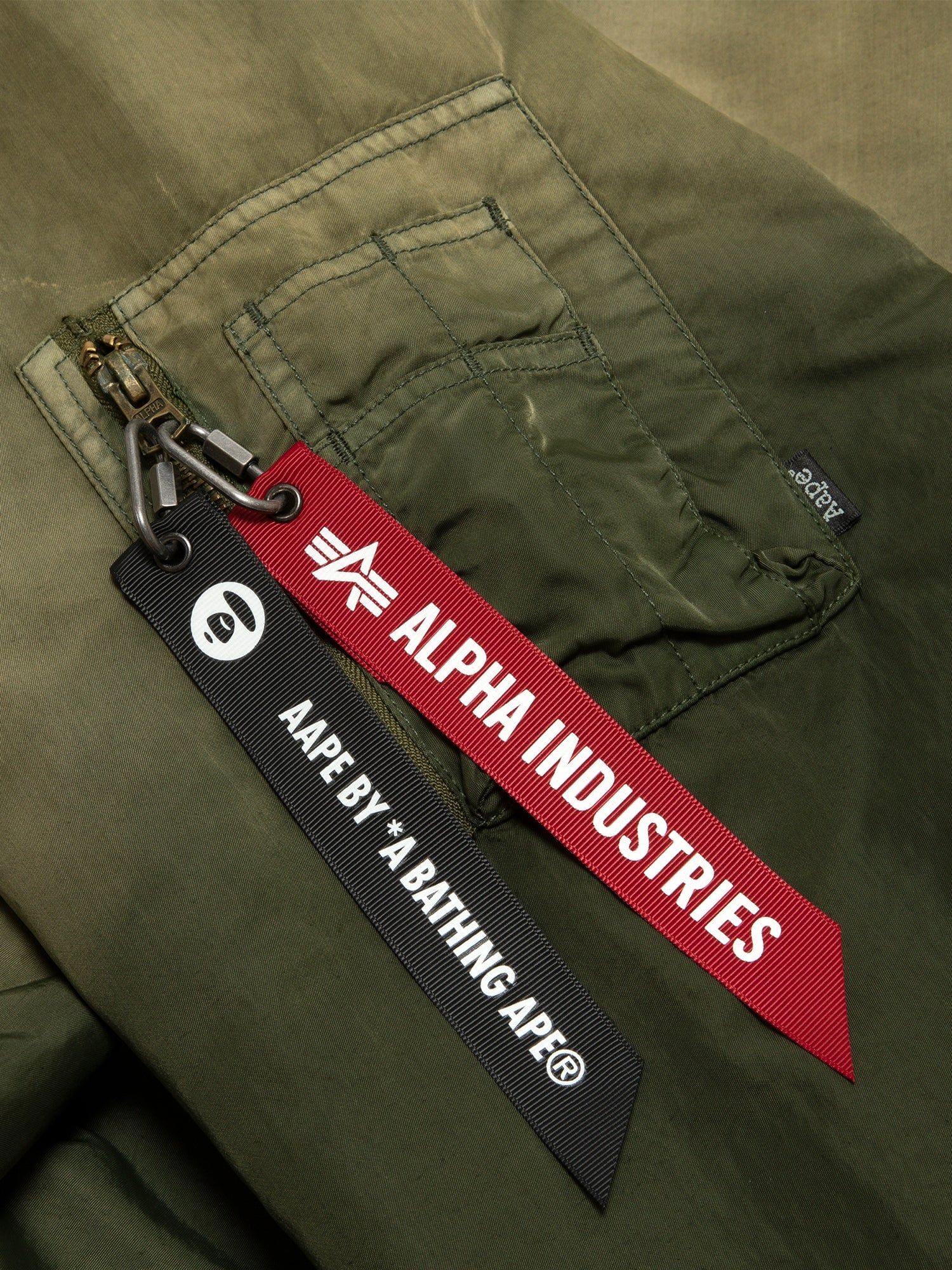 AAPE X ALPHA REVERSIBLE PADDED MA-1 QUILTED JACKET OUTERWEAR Alpha Industries / FW24-AAPE 