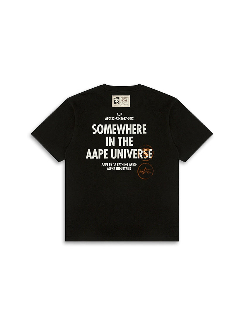 The AAPE X Alpha Somewhere In Universe Tee By Alpha Industries; Features Somewhere in the AAPE Universe Text And Branding.