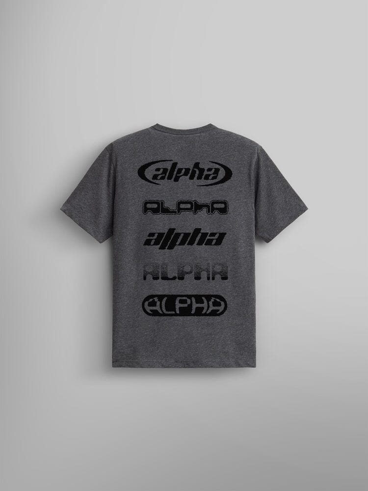 The Alpha Industries Alpha Logos Tee is a unisex gray T-shirt that features the iconic Alpha logo in a variety of fonts in black on the back.