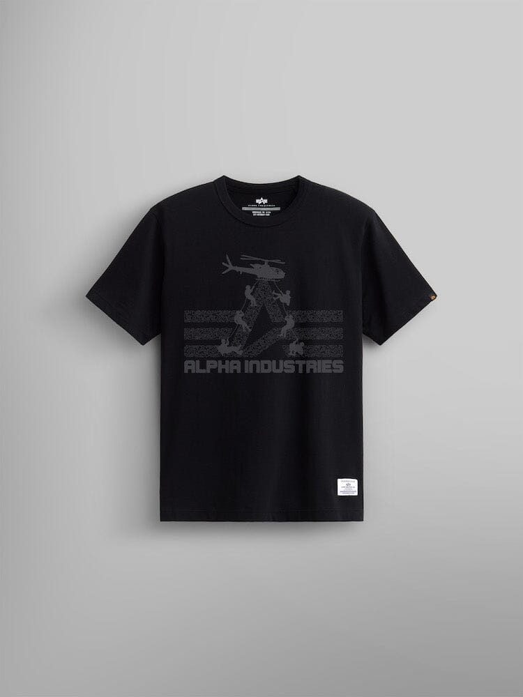 ALPHA AIR ASSAULT REPEL TEE by Alpha Industries in BLACK, featuring a subtle helicopter graphic alongside the brand logo, set against a plain gray background.