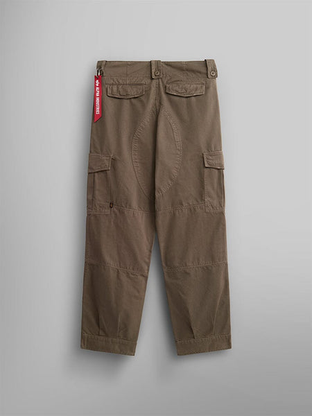 Back view of the Belgian M-64 Pant in brown by Alpha Industries features buttoned back pockets and a red tag.