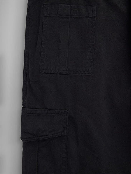 Close-up of the black Belgian M-64 Pant's pocket with flap detail, highlighting the functional style. By Alpha Industries.