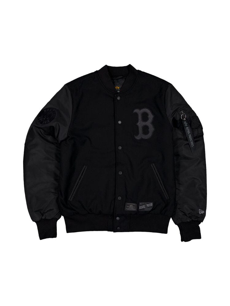 The Boston Red Sox X Alpha X New Era Wool Varsity MA-1 Bomber Jacket by Alpha Industries, in black, showcases a prominent B emblem on the chest and features ribbed cuffs, snap buttons, and a zip pocket on the sleeve.