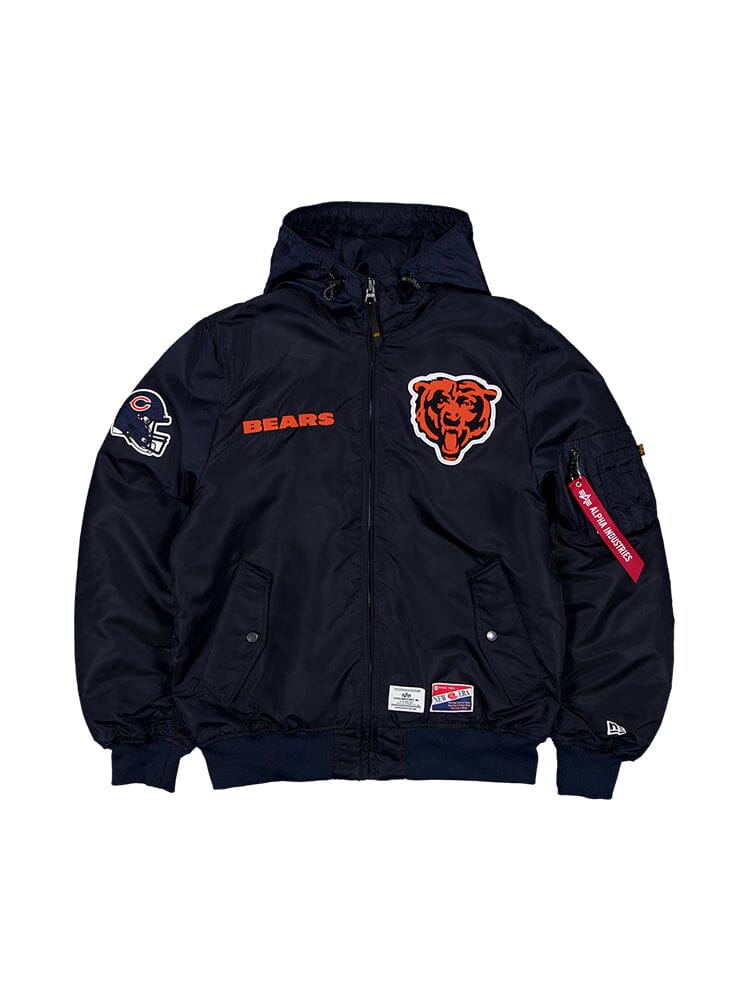 The Chicago Bears x Alpha x New Era Hooded MA-1 Bomber Jacket, designed by Alpha Industries in Replica Blue, features a bear logo, Bears text, and patches on the sleeves. It is perfect for NFL enthusiasts and Chicago Bears fans alike.