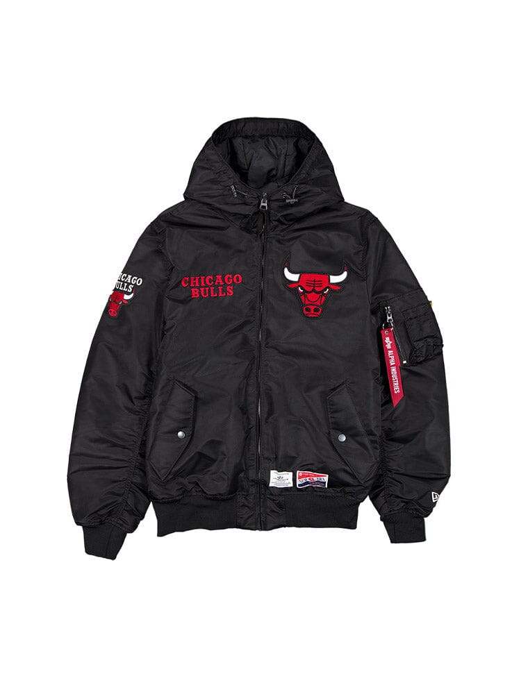 The Chicago Bulls X Alpha X New Era L-2B Hooded Bomber Jacket by Alpha Industries is a black bomber jacket featuring a red Chicago Bulls logo and text on the front, complete with a hood, multiple pockets, and stylish NBA team patches.