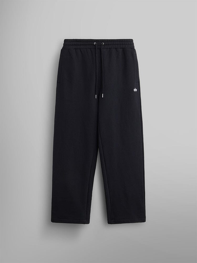 The Women's Essential Sweatpants by Alpha Industries in black soft cotton. They come with an elastic waistband and a small embroidered logo on the upper left.