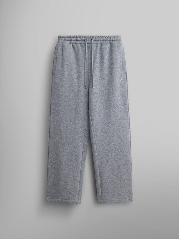 Women's Essential Sweatpants by Alpha Industries in medium charcoal heather. Made from soft cotton fabric, they feature an elastic waistband with a drawstring, two side pockets, and a small embroidered logo on the left side.