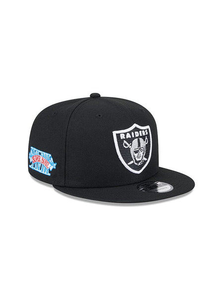 The Las Vegas Raiders x Alpha x New Era 950 Cap showcases the iconic team logo on the front and a striking Super Bowl patch on the side, designed in collaboration with Alpha Industries for added style.