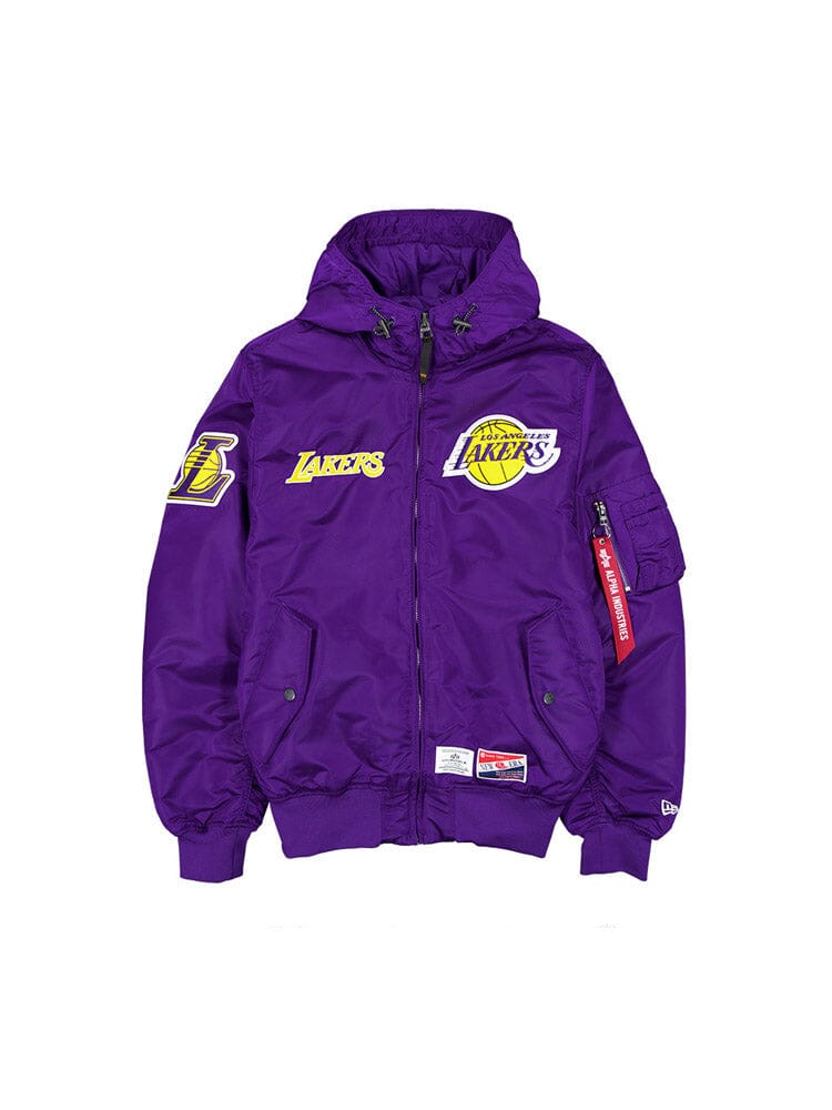 The Los Angeles Lakers X Alpha Industries X New Era L-2B Hooded Bomber Jacket in Purple by Alpha Industries showcases prominent team logos, a striking red zipper pull, and eye-catching team patches. This fashionable front-view jacket is also water-resistant, making it ideal for any weather conditions.