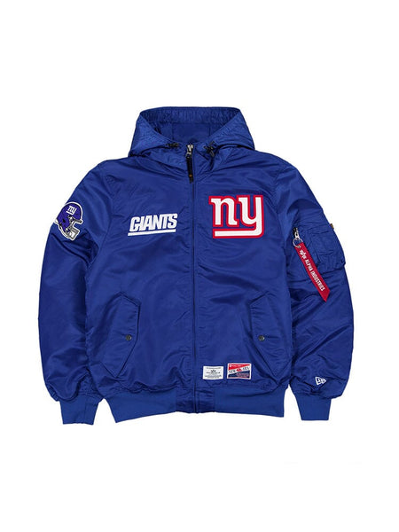 Pacific blue L-2B Bomber Jacket from Alpha Industries, in collaboration with New Era and the New York Giants, showcasing team text and logos, complete with a distinctive red zip tag on the sleeve.