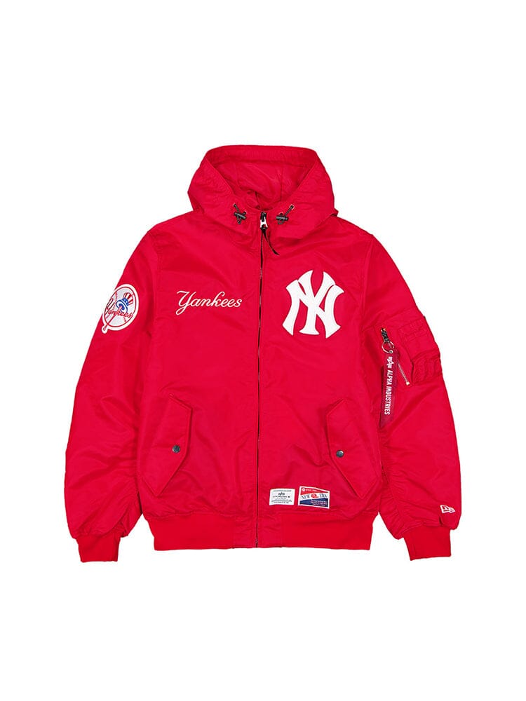 This New York Yankees x Alpha x New Era L-2B Bomber Jacket in Speed Red elegantly displays the legendary Yankees logo, features a patch on the sleeve, and boldly spells "Yankees" across the front—an essential piece for any MLB jacket enthusiast.