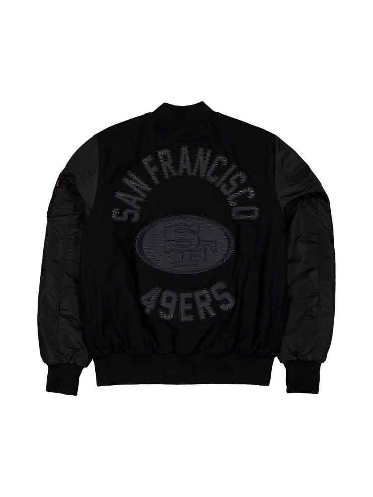 The San Francisco 49ers x Alpha x New Era Wool Varsity MA-1 Bomber Jacket by Alpha Industries features a large logo on the back, designed in black with a wool outer shell for warmth.