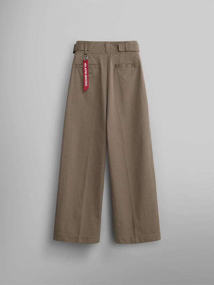 Back view of the Women's Gurkha Wide Leg Trouser in brown from Alpha Industries, featuring elegant high-waisted khaki trousers with belt loops, side pockets, and a distinctive red zipper tag.