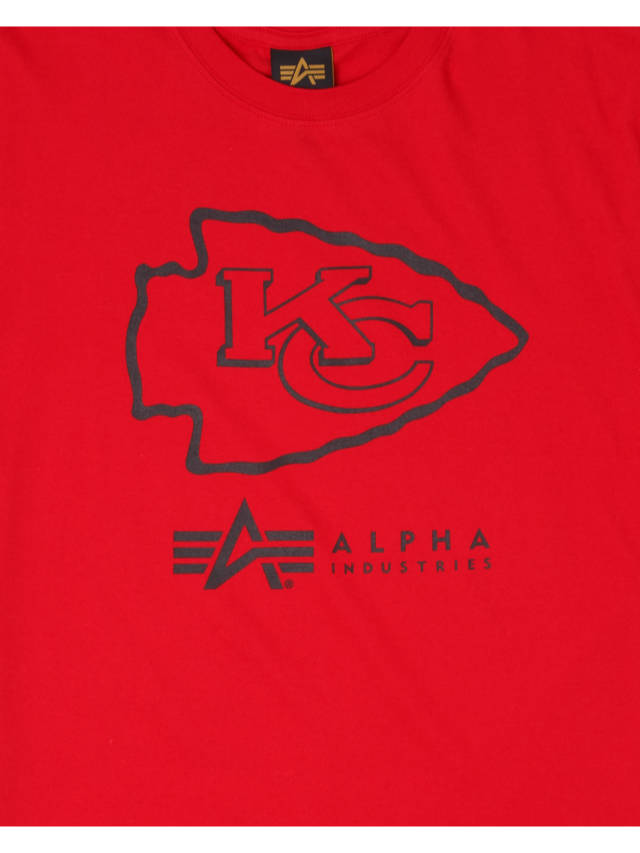 Red Kansas City Chiefs x Alpha x New Era t-shirt showcasing a striking team logo with "Alpha Industries" text below, elegantly highlighted by a twill applique.