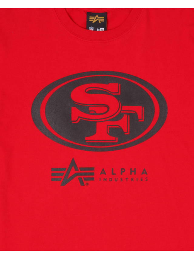 Red San Francisco 49ers x Alpha x New Era T-Shirt featuring a black oval screen print with large letters "SF" and "Alpha Industries" text below, by the brand Alpha Industries / NE-NFL.